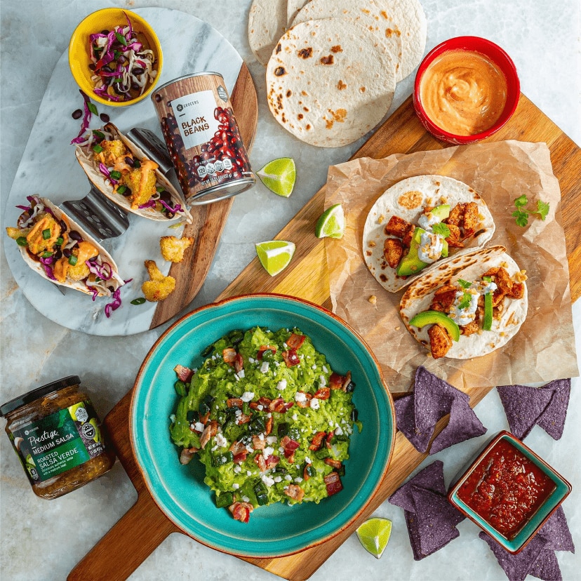 Seasoned Chicken Tacos with Cilantro-Walnut Cream & Avocado