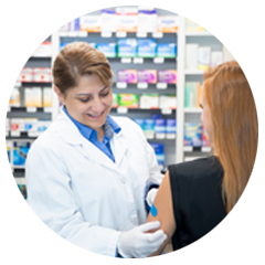 Harveys Pharmacist giving COVID-19 Vaccine