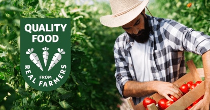 Male farmer holding a box of tomatoes with text that reads "quality food from real farmers"