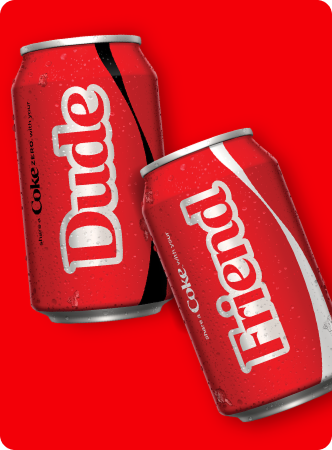 Two Coca-Cola cans featuring the word "Dude" and "Friend" prominently displayed on their labels.